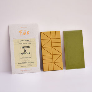 FJAK Sjokolade 36% bílá čokoláda SEA BUCKTHORN & MATCHA s rakytníkem a matchou BIO 60 g